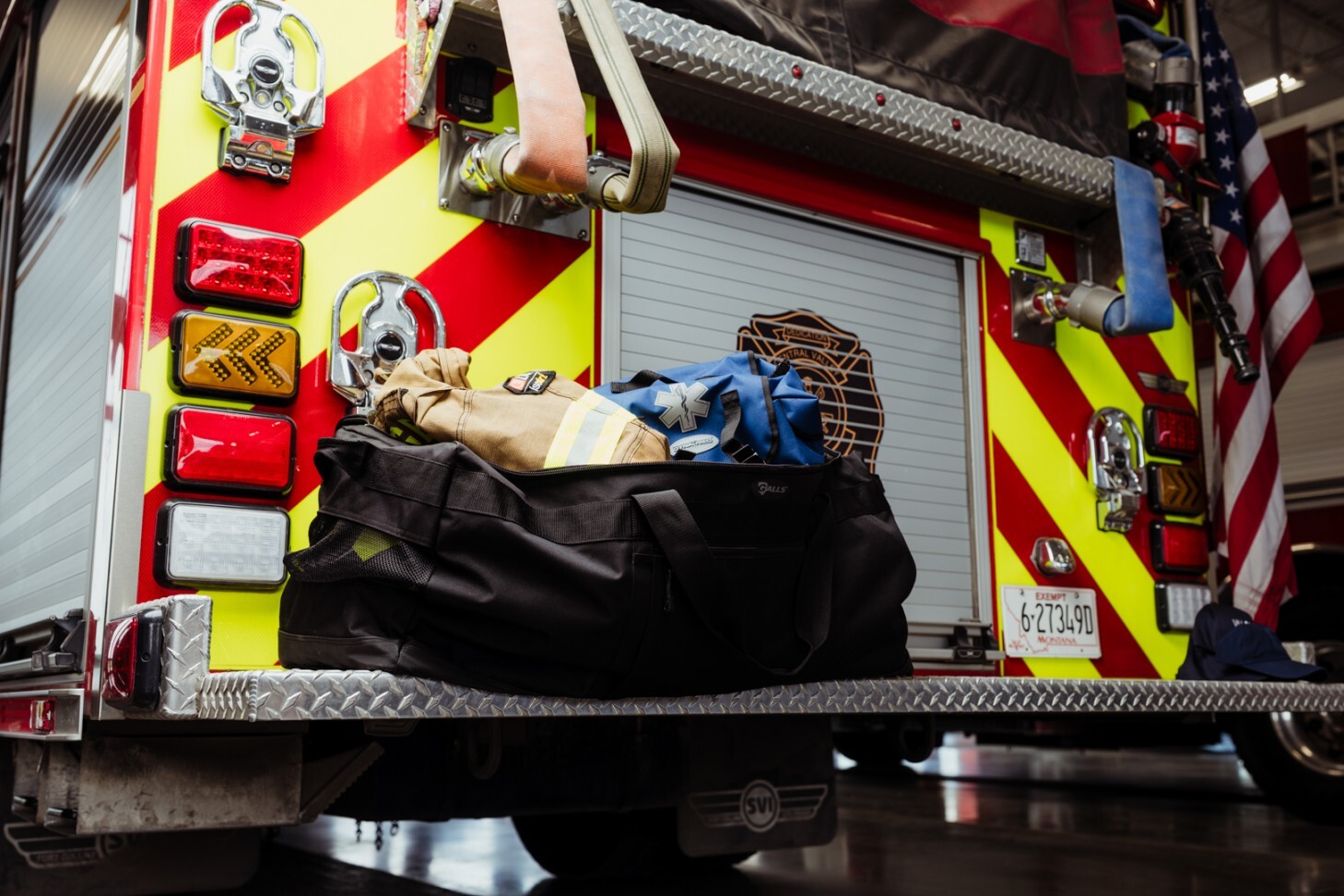 fire gear on back of fire truck