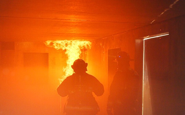 firefighters fighting house fire