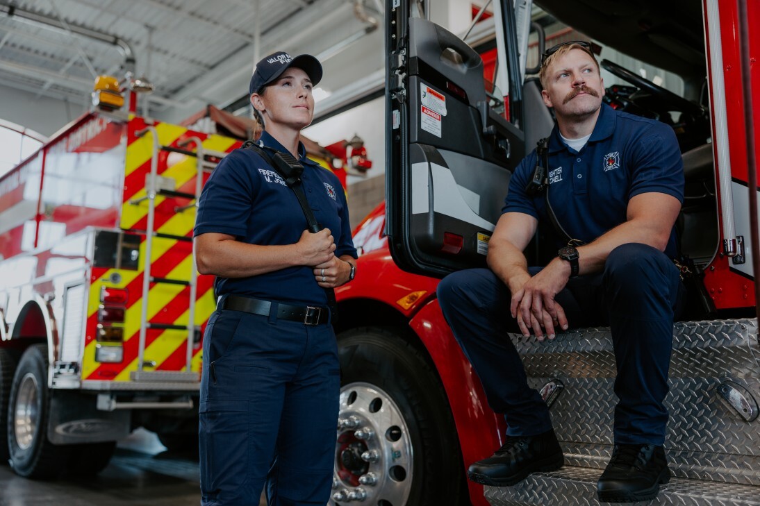 firefighters by firetruck