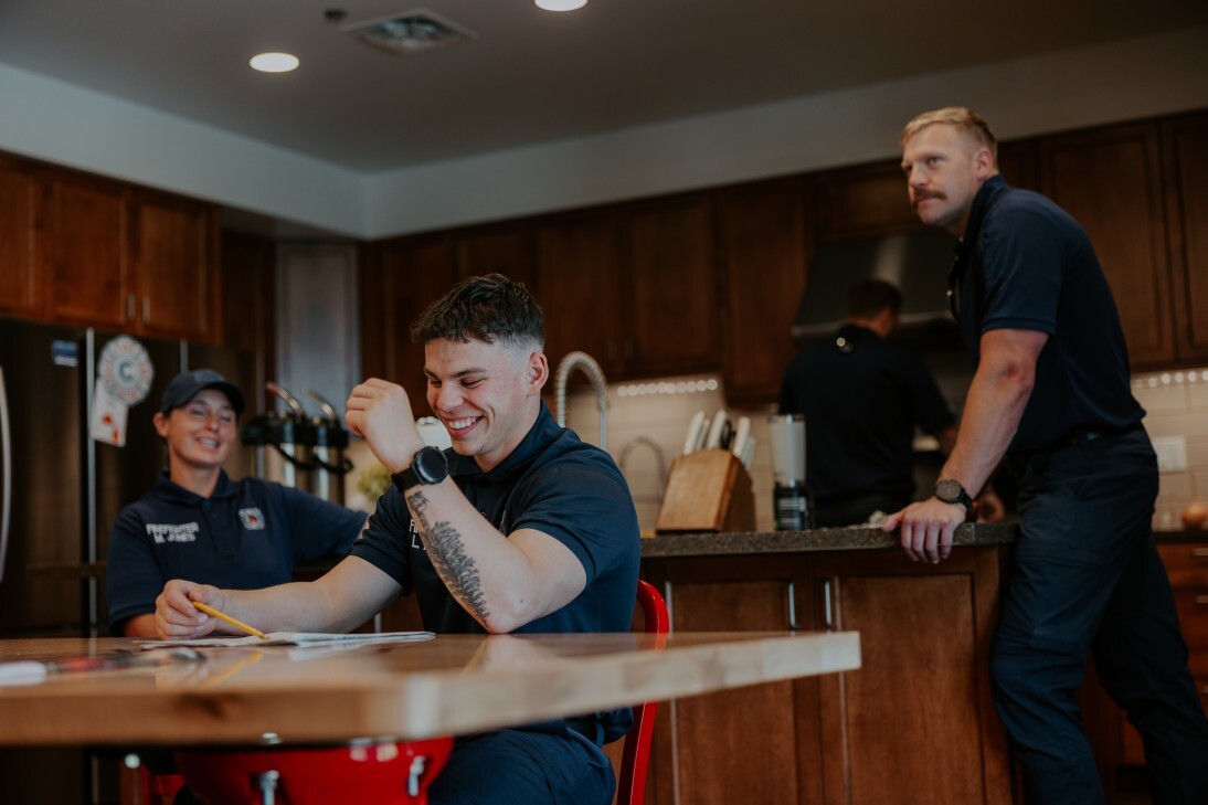 firefighters gathered in kitchen